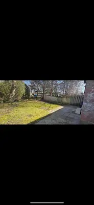 a view of a park with trees and a street at Affordable Basment Apartment - London in London