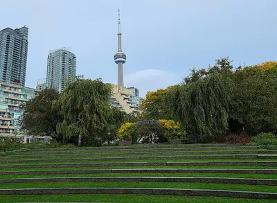 a set of stairs in a park with a tower at City View Towers - Steps to CN Tower - Indoor Pool - Save on 4 weeks stay in February in Toronto