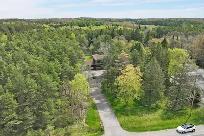 an aerial view of a road in a forest at Newly renovated luxury villa in Stouffville, ON in Stouffville