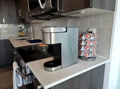 a kitchen with a coffee maker on a counter at Lakeview Escape Endy KING BED in Pickering
