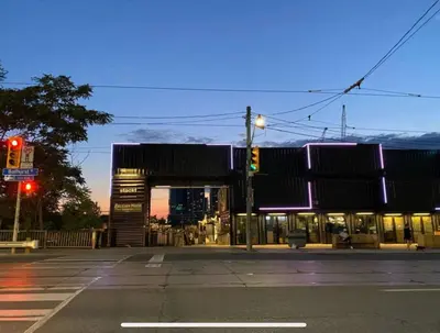 a building on a city street with a traffic light at Central Downtown Toronto - Trinity Bellwood Park in Toronto