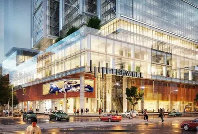 a rendering of a large glass building on a city street at Central Downtown Toronto - Trinity Bellwood Park in Toronto