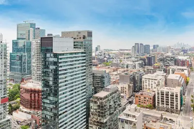 an aerial view of a city with tall buildings at 1BR Space - Downtown Toronto in Toronto