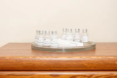 a group of bottles of medicine on a wooden table at Room in cozy house close to Lawrence Ave, WiFi, parking in Toronto