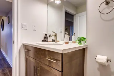 a bathroom with a sink and a mirror at GLOBALSTAY New Basement 4 Bd in Port Elgin in Port Elgin