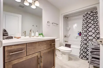 a bathroom with a sink and a toilet and a shower at GLOBALSTAY New Basement 4 Bd in Port Elgin in Port Elgin