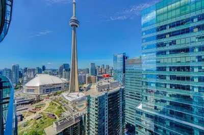 a view of the cn tower in a city at The Urban Escape in Toronto