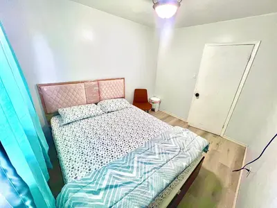 a small bedroom with a bed in a room at D3 Room Near Airport in Brampton
