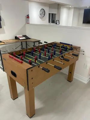 a foosball table with at Akhtar's Residence in Mississauga