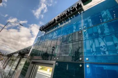 a blue building with windows on the side of it at Entire 1 bedroom in the heart of KW downtown across Google in Kitchener