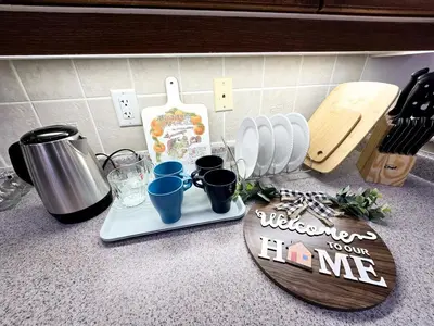 a kitchen counter with a welcome to ourmite sign on it at Harbour for rest in Vaughan