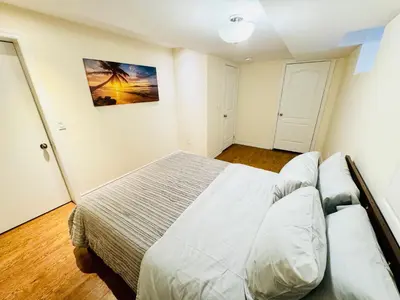 a bedroom with a bed in a room at Modern 1-Bedroom Apartment - Near Airport & Toronto Downtown in Brampton
