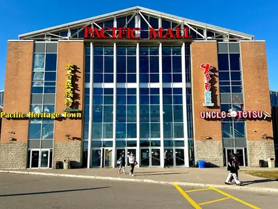 a large building with people walking in front of it at Cozy and spacious vacation home in Toronto in Toronto