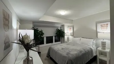 a white bedroom with a bed and a window at Ivylea Elegant Luxury Estate Richmond Hill in Richmond Hill