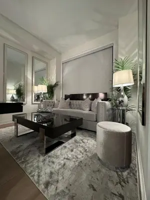 a living room with a couch and a table at Ivylea Elegant Luxury Estate Richmond Hill in Richmond Hill