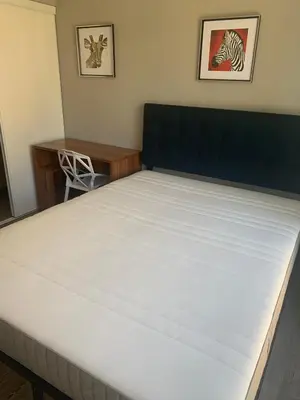 a bed room with a large white mattress at Sandy&Kevin#home in Waterloo