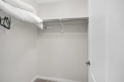 a room with a bed and a window at The Bliss in Bowmanville
