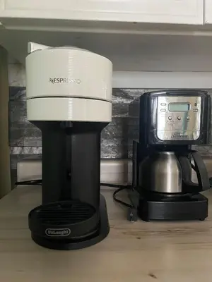 a coffee maker and a coffeemaker on a counter at Sunrise and Bayview with SNOW SHOES, WATERCRAFTS , BIKES in Meaford