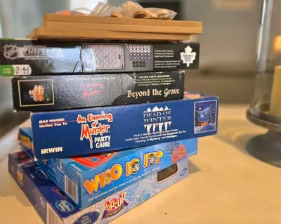 a stack of video game books on a table at The Elm - 36 Hollow in Cherry Valley