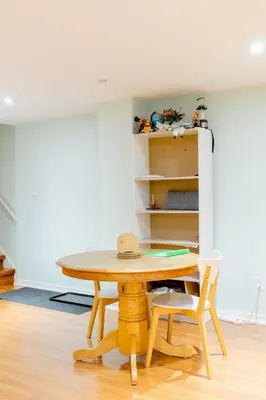 a table with a hat on it in a room at Large Guest suite with bathroom, vegetarian kitchen in Mississauga