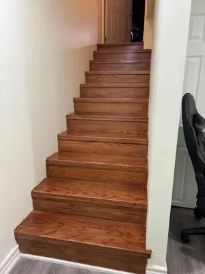 a staircase with wood treads in a house at B02 luxurious suite in Mississauga