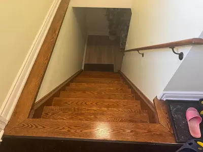 a staircase with wooden floors and a stair case at B3 Luxury home in Mississauga nearby shipping center square one in Mississauga
