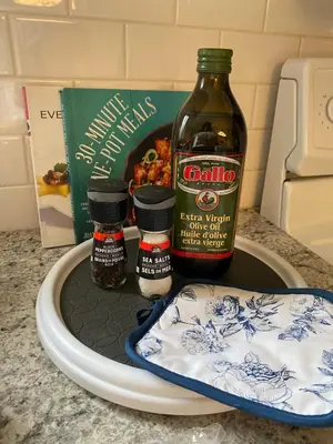 a bottle of alcohol and other ingredients on a counter at Cheerful 4 bedroom with sunroom in Belleville