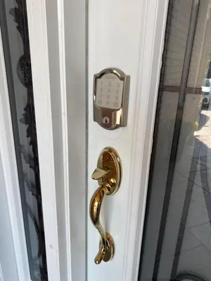 a door handle with a clock on it at F3 Spacious room with 2 queen beds and TV in Mississauga