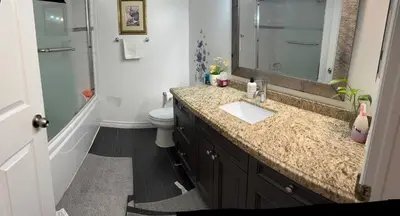a bathroom with a sink and a toilet at 201 Large Private Bedroom on second floor in Mississauga