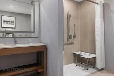 a bathroom with a sink and a shower at Hyatt Place Mississauga / Airport Corp Center in Mississauga