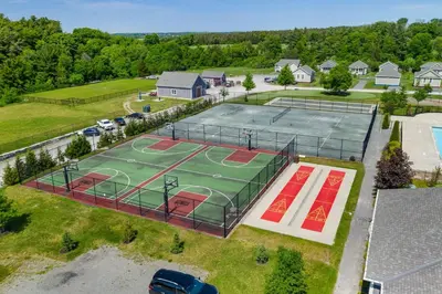an overhead view of a tennis court with a tennis at The Amanita - 9 Hollow in Cherry Valley