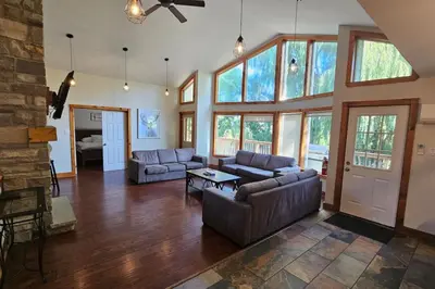 a living room with two couches and a fireplace at All-Season 8BR Vacation Chalet in Blue Mountains