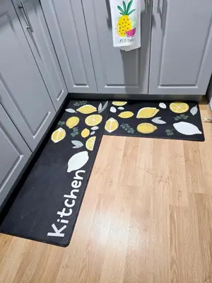 a welcome mat in front of a refrigerator at Welcome to your Serene Gateway in London