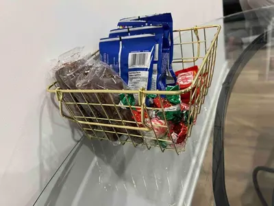a basket of food sitting on top of a refrigerator at Cozy 2Bed Home 6 minutes to the FALLS! in Niagara Falls