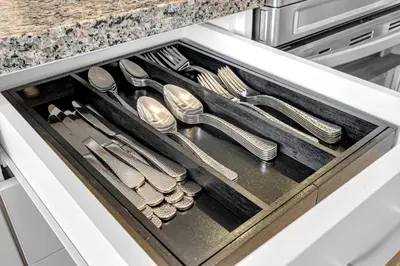 a drawer in a kitchen with silver utensils at Spacious 6bed Home near Pier Niagara Toronto QEW in Burlington