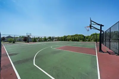 a basketball court with a basketball hoop at The Osprey - 41 Butternut in Cherry Valley