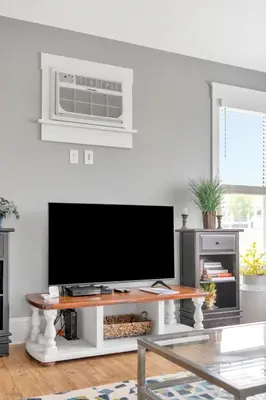 a living room with a flat screen tv on a table at The Osprey - 41 Butternut in Cherry Valley