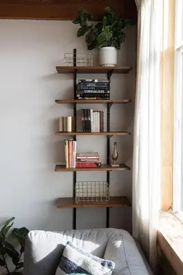 a living room with wooden shelves and a couch at Downtown 1BR Modern Condo in Toronto
