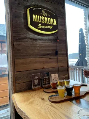 a sign formuskota brewery on the wall of a restaurant at Century Home in Bracebridge Muskoka in Bracebridge