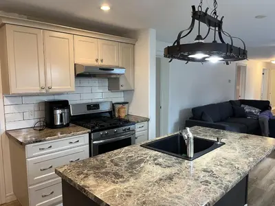 a kitchen with a sink and a counter top at Crystal Beach home in Niagara in Fort Erie
