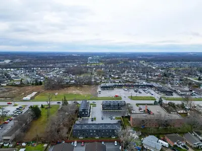 an aerial view of a parking lot in a city at NEW Stylish 2BR Suite With Sofa Bed, 7 Mins to Niagara Falls and Sleeps 6 in Niagara Falls