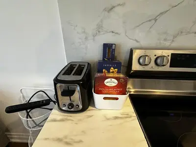 a kitchen counter with a coffee maker and a toaster at Brand New 2 story unit in Richmond Hill