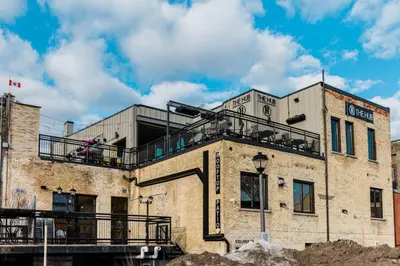 a building with a balcony on top of it at The Wallace Suite - Stratford in Stratford