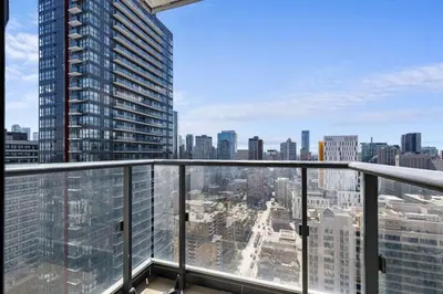 a view from the balcony of a skyscraper at Downtown 2 bedroom Condo with Private Balcony in Toronto