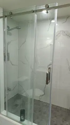 a shower with a glass door in a bathroom at Garden View in Schomberg
