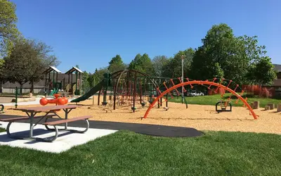a park with a playground with a slide at Comfortable & Spacious Private Room with Ensuite in Corso Italia in Toronto