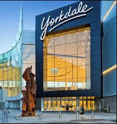 aventral store with a statue in front of it at Midtown Toronto suite in Toronto