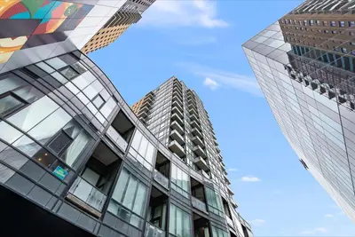 a view of two tall buildings in a city at DT High Rise Condo w Private Patio and View in Kitchener