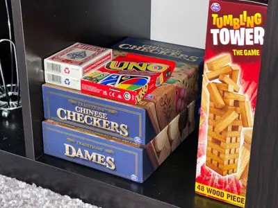 a stack of games and a box of wii towers at Spacious 4BR Home with Parking in Richmond Hill