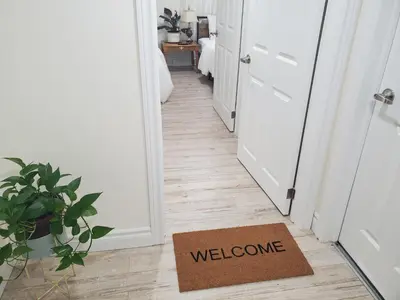 a welcome mat on the floor of a hallway at Home of Sweet Dream in Whitby